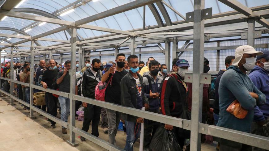 The oppression of the Palestinian workers at Erez Crossing is an example of the dark face of the occupation.