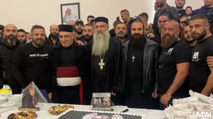 Soldiers of God with a Church priest celebrating