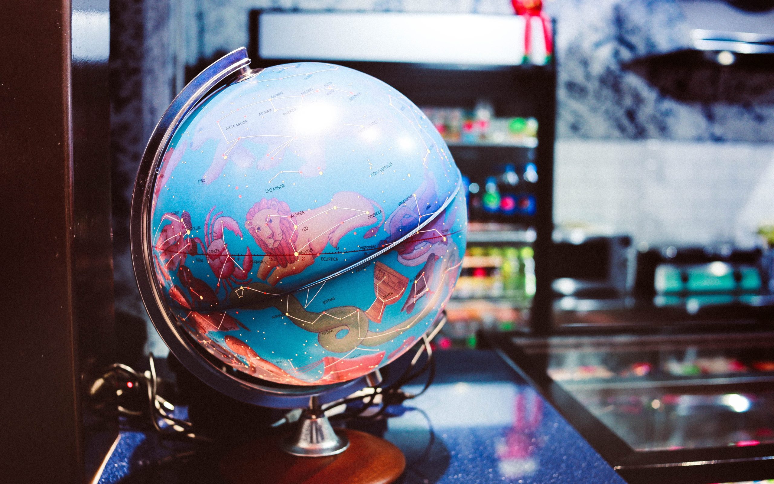 A world globe on a desk.