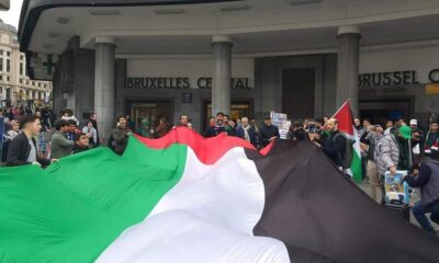 Supporters carrying the Palestinian Flag