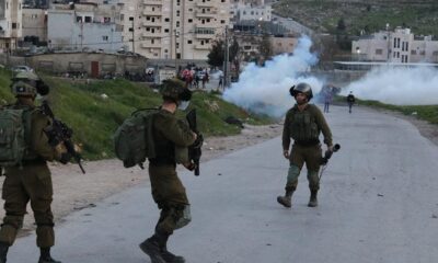 IDF shooting gas canisters